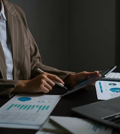 financial-expert-analyzing-profit-with-detailed-graphs-calculations